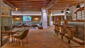 TV a/nebo společenská místnost v ubytování Hotel zur Mühle