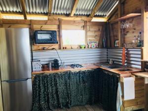 Cucina o angolo cottura di Bungalow de charme vue mer