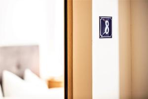 Postel nebo postele na pokoji v ubytování Hotel Münsterhof