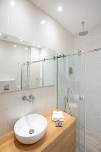 Koupelna v ubytování Suites Sole + 15 fotografií