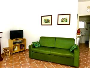 TV a/nebo společenská místnost v ubytování Villa Il Carrubo - Basilicata
