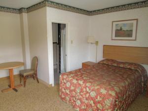 Postel nebo postele na pokoji v ubytování Red Lion Motel Southampton