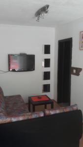 TV in/ali zabaviščno središče v nastanitvi Apartma Tereza