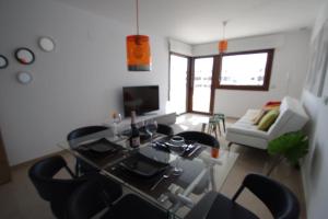 A television and/or entertainment centre at Oriuelha Costa Terrazas de Campoamor