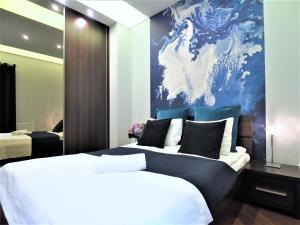Posteľ alebo postele v izbe v ubytovaní VIP Apartamenty Gorące Źródła