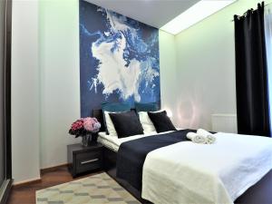 Posteľ alebo postele v izbe v ubytovaní VIP Apartamenty Gorące Źródła