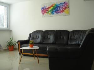 Posezení v ubytování Apartment Premantura