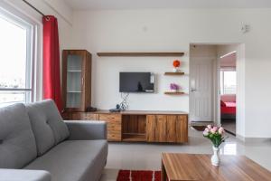 TV a/nebo společenská místnost v ubytování Mistyblue Serviced Apartments