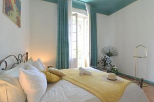 Ένα ή περισσότερα κρεβάτια σε δωμάτιο στο Villa Palma