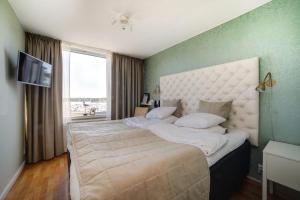 Letto o letti in una camera di Sundbyholms Slott