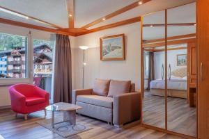 Posezení v ubytování Hotel Beau Rivage