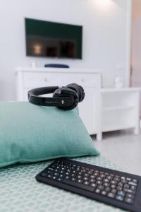 A television and/or entertainment centre at Club Vista Serena