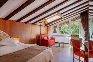 Postel nebo postele na pokoji v ubytování Hotel Beau Rivage