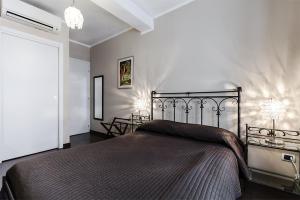 Postel nebo postele na pokoji v ubytování Castaldi house