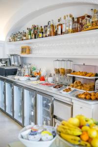 a kitchen with a bunch of food on display at Hotel Villa Gabrisa in Positano