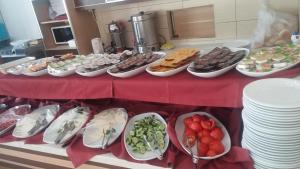 a table with many plates of food on it at Oreko Express in Afyon