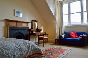 O zonă de relaxare la Central Edinburgh 4 Bedroom Flat