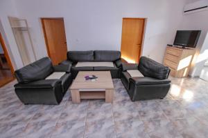 Гостиная зона в Apartments Dinko