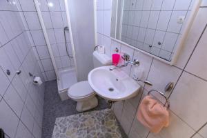 Ванная комната в Apartments Dinko