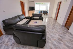 Гостиная зона в Apartments Dinko