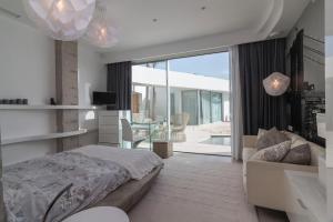 Posteľ alebo postele v izbe v ubytovaní Villa Equilibrium Costa Adeje + 37 fotografií