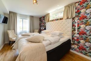 Letto o letti in una camera di Sundbyholms Slott