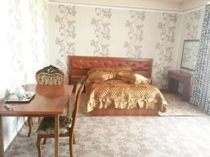 Hotel SUGD & Guest House客房内的一张或多张床位