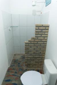 Et badeværelse på Casa Aconchegante em Caraíva - Casas Do San