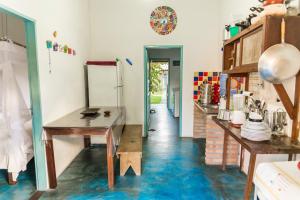 Køkken eller tekøkken på Casa Aconchegante em Caraíva - Casas Do San + 9 billeder