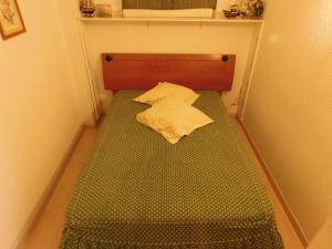 A bed or beds in a room at GMID IMMO A187 Apartamento Port Canigo
