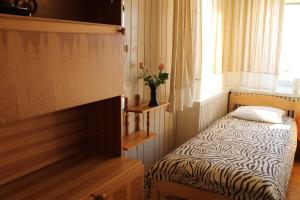 Postel nebo postele na pokoji v ubytování Lepa Guest House