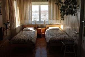 Postel nebo postele na pokoji v ubytování Lepa Guest House