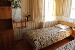 Postel nebo postele na pokoji v ubytování Lepa Guest House