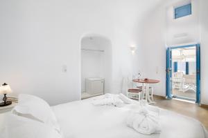 Voodi või voodid majutusasutuse Pantelia Suites toas