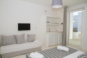 Μια τηλεόραση ή/και κέντρο ψυχαγωγίας στο Dimora Ausentum B&B +38 φωτογραφίες