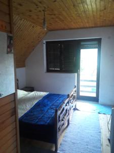 Łóżko lub łóżka w pokoju w obiekcie Apartments Zekovic