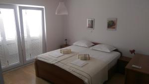 Postel nebo postele na pokoji v ubytování Holiday home Olive + 37 fotografií