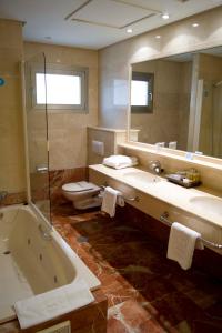 Koupelna v ubytování Hotel Villamadrid