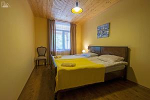 Letto o letti in una camera di Becho House