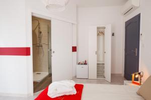 Postel nebo postele na pokoji v ubytování Les villas du triangle - chambres d'hôtes