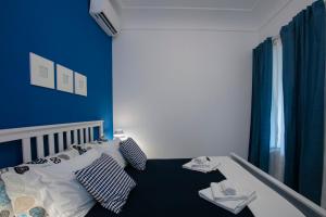 Posteľ alebo postele v izbe v ubytovaní Capri Blue