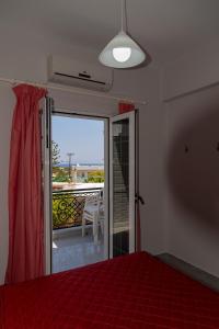 Postel nebo postele na pokoji v ubytování Lazaros Home 1