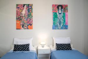 Postel nebo postele na pokoji v ubytování Lazaros Home 1