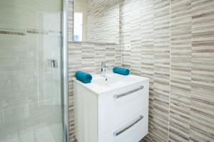 Koupelna v ubytování Les villas du triangle - chambres d'hôtes