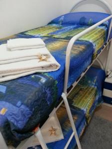 a couple of bunk beds in a room at Villa Fiorella in Sciacca