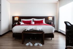 Postel nebo postele na pokoji v ubytování Best Western Plus 93 Park Hotel