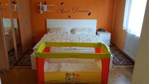 Łóżko lub łóżka w pokoju w obiekcie Garden Apartment Donau-City (P&R)