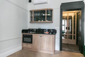 Kuchyňa alebo kuchynka v ubytovaní Apartamenty Stary Rynek 25 Toruń