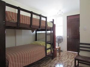 Poschodová posteľ alebo postele v izbe v ubytovaní Posada Gino