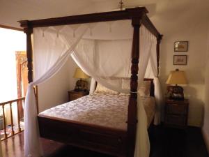 Lova arba lovos apgyvendinimo įstaigoje Villa Papaya